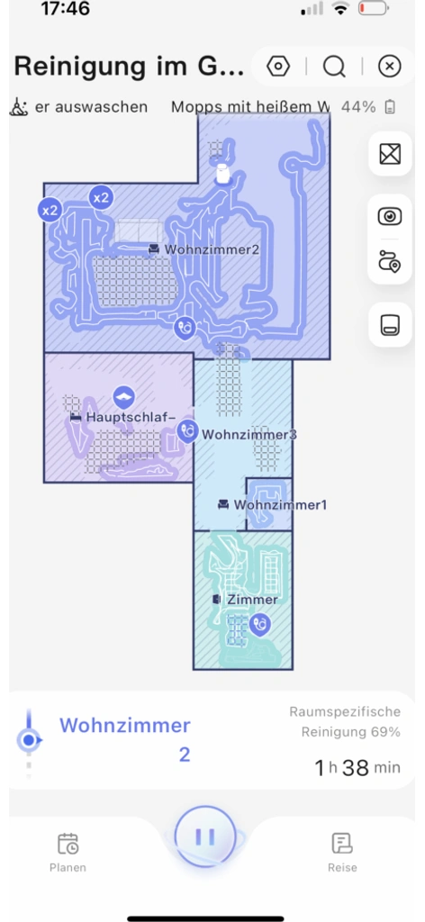 Screenshot der Narwal-App mit einer farblich unterteilten Wohnungsübersicht. Sichtbar sind fünf Räume mit Reinigungsrouten, Symbolen für Moppreinigung und Zwischenstände. Aktuell ist Wohnzimmer 2 in Bearbeitung, 69 % sind erledigt.