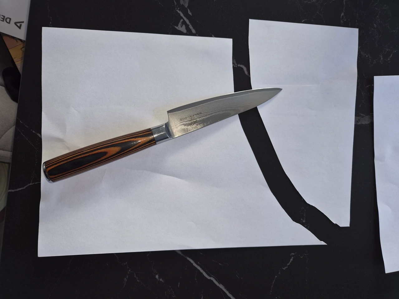 CUTMORE ProSharp: Papiertest mit Kochmesser