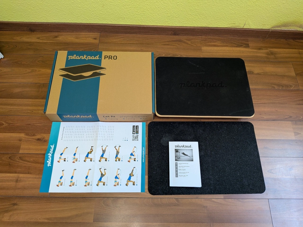 Plankpad Pro: Lieferumfang mit Matte, Poster und Anleitung