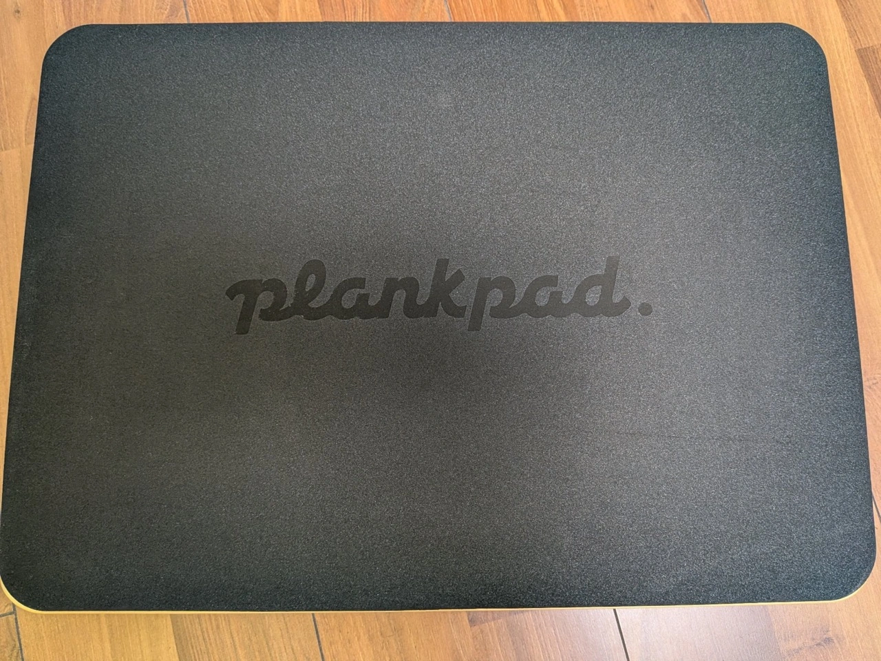 Plankpad Pro: Schaumauflage mit Plankpad-Logo