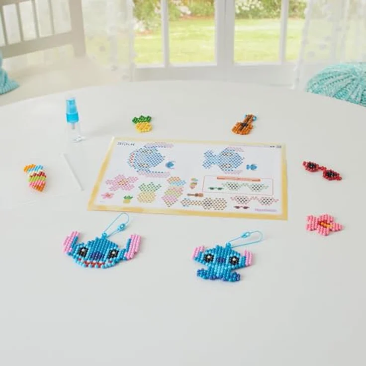 Aquabeads Kreativset Stitch, Schlüsselanhänger Bastelset mit 700 bunten Perlen, inkl. Glitzer- und Polygonperlen, für Kinder ab 4 Jahren – Bild 5