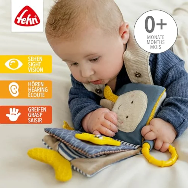 Fehn Greifspielzeug Otter Theo, Fühlbuch mit Quietsche, Spiegel und Greifring für Babys und Kleinkinder ab 0 Monaten – Bild 2