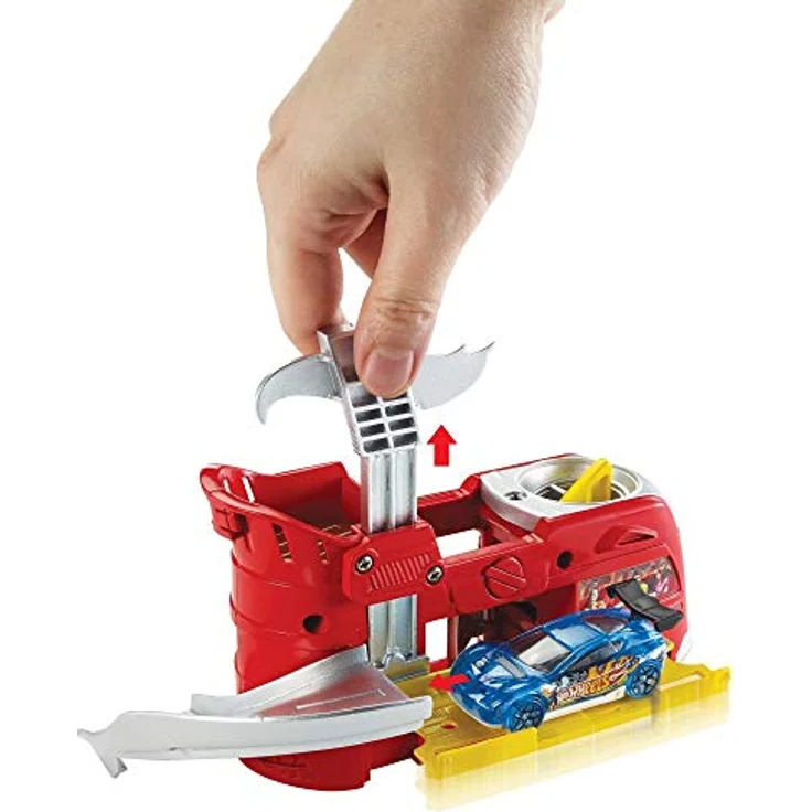 Hot Wheels Dine & Dash Playset, ausklappbares Rennbahn-Spielset mit Autowäsche, Garage und Spukhaus – Bild 2