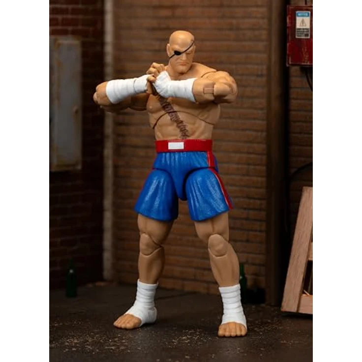 Jada Toys Street Fighter Figur Sagat, 19 cm bewegliche Actionfigur mit alternativem Kopf, Händen und Zubehör, ab 13 Jahre – Bild 2