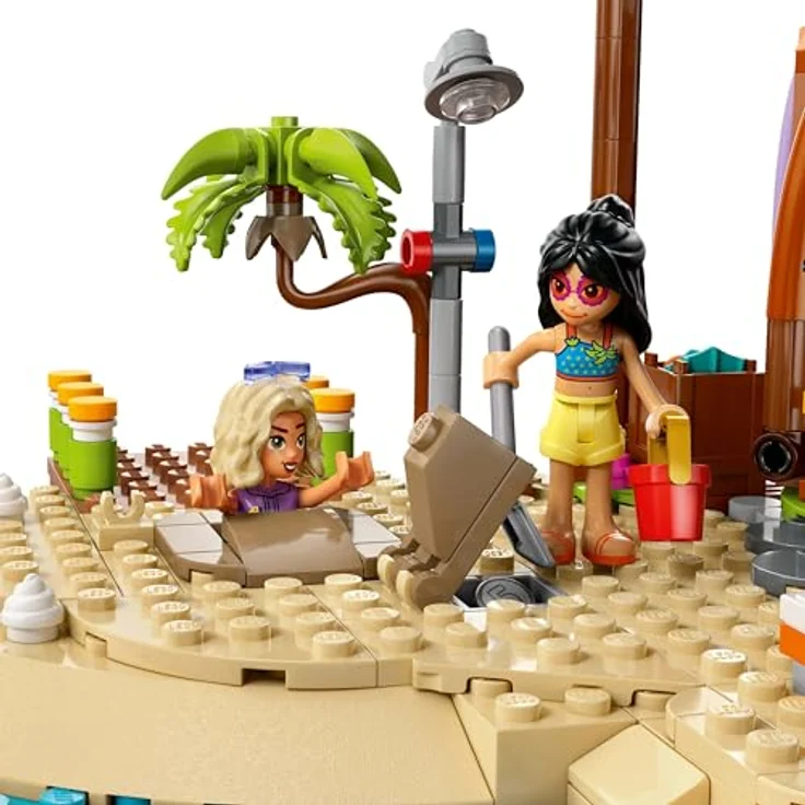 LEGO Friends 42673 Familienurlaub im Strandresort Bausatz, inkl. 6 Minifiguren, Delfin und Schildkröte, 1140 Teile, Mehrfarbig – Bild 5