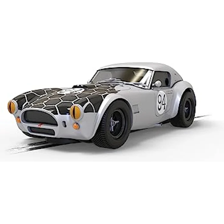 Scalextric Shelby Cobra 289 - CSX2201 - Snake Eyes, Rennbahn Zubehör mit Schlangenleder-Optik und Motorsportgeschichte – Bild 1