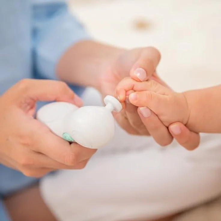 Miniland Baby-Nagelfeile, Elektrische Nagelfeile für Babys mit 6 austauschbaren Köpfen und Sicherheitsabschaltung – Bild 2