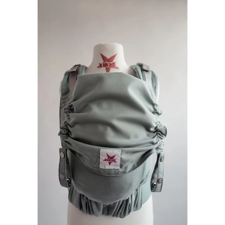 KOKADI Babytrage Flip Just Mint - ✓ Ergonomisch ✓ Steg verstellbar ✓ ab Geburt ✓ 100% Bio-Baumwolle ✓ GRATIS Beutel - Größe: Baby