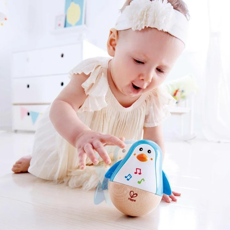 Hape E0331 - Stehauf-Pinguin, Stehaufmännchen mit Klang, blau, ab 6 Monaten – Bild 3