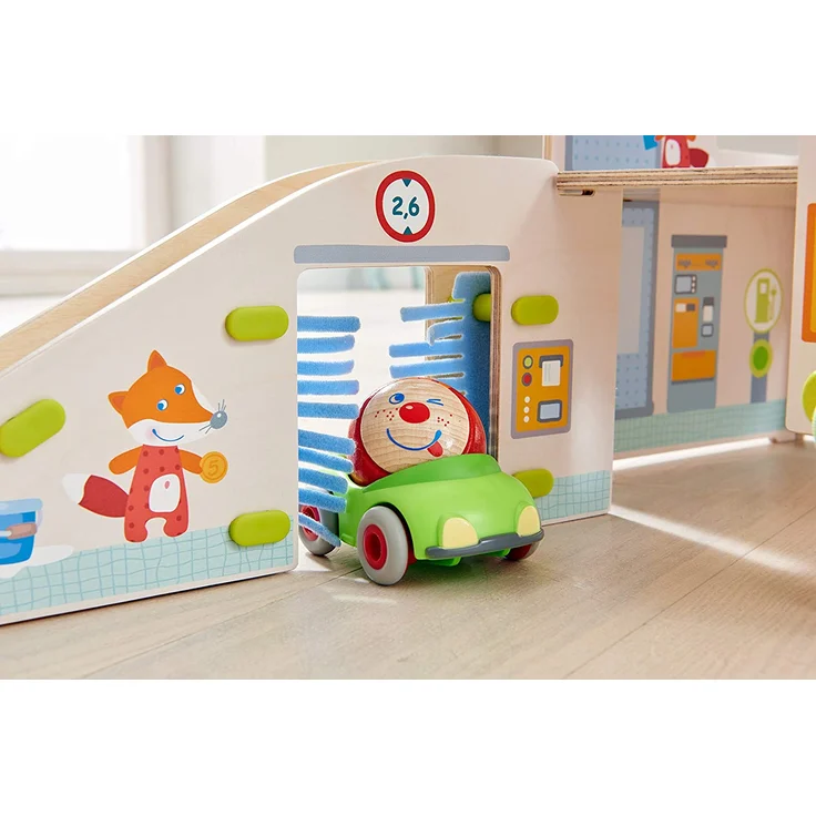 HABA 303828 Kullerbü – Spielbahn Parkhaus, Holzkugelbahn und Motorikspielzeug mit Waschstraße, Hebebühne und Tankstelle, Mehrfarbig – Bild 6