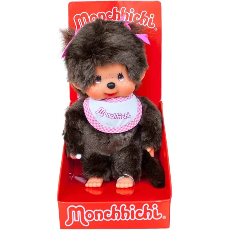 Sekiguchi 255550 - Original Monchhichi Mädchen, aus braunem Plüsch, mit pinkem Lätzchen und Zöpfen mit Schleifen, ca. 20 cm