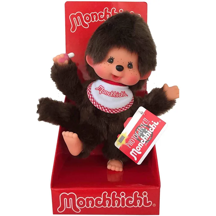 Sekiguchi 255177 - Original Monchhichi Junge, aus braunem Plüsch, mit rot-weißem Lätzchen, ca. 20 cm