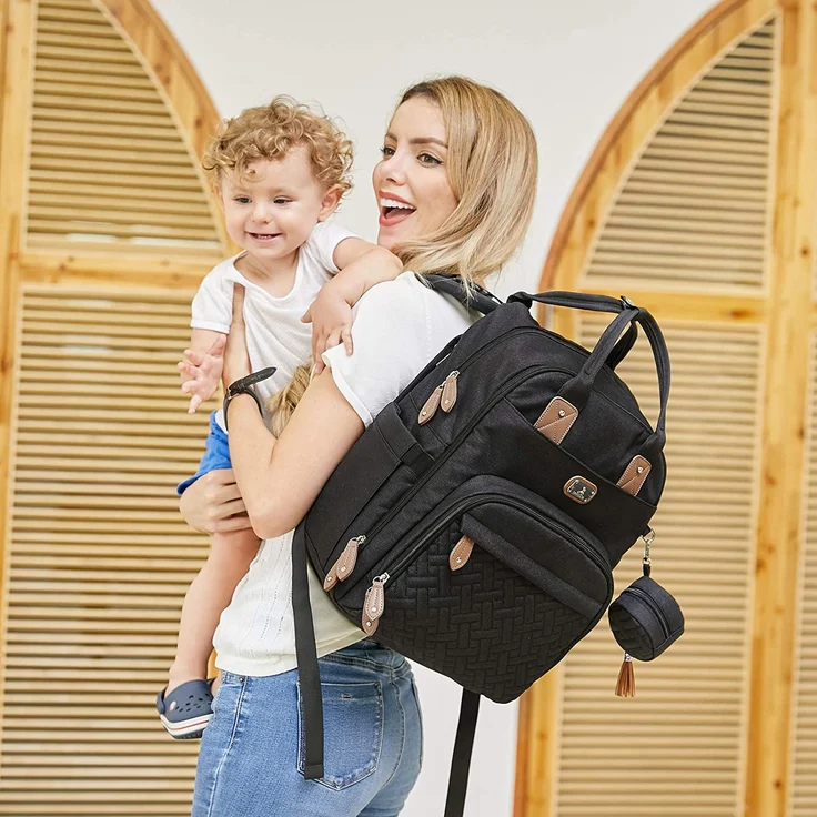 Wickeltasche Rucksack - Dikaslon Großer Wickelrucksack mit Multifunktions-Babytaschen und mobiler Wickelauflage - Schnullerhalter und Kinderwagengurte - für Mama und Papa (schwarz) – Bild 6
