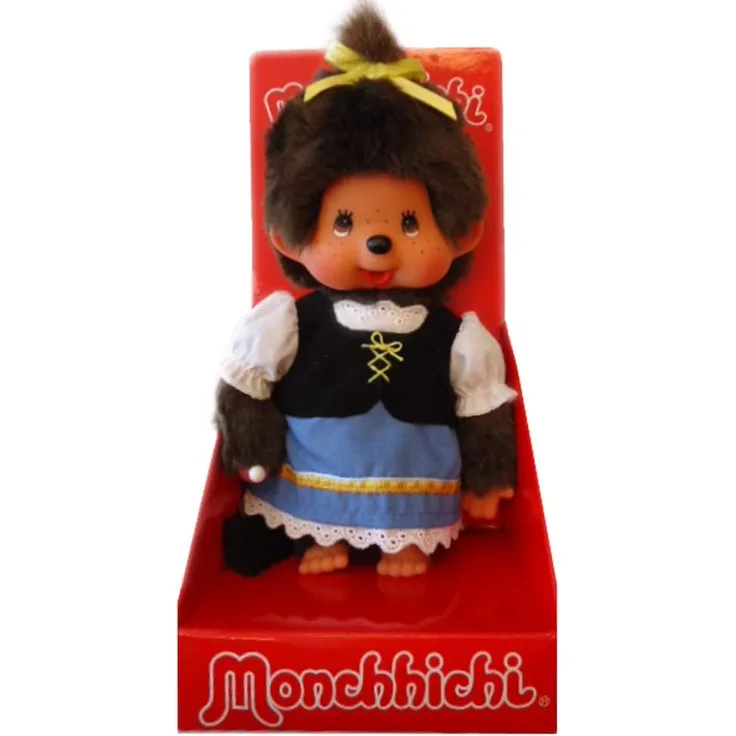 Sekiguchi 242047 - Original Monchhichi Bayrisches Mädchen, aus braunem Plüsch, mit Kleid und Zopf mit Schleife, ca. 20 cm