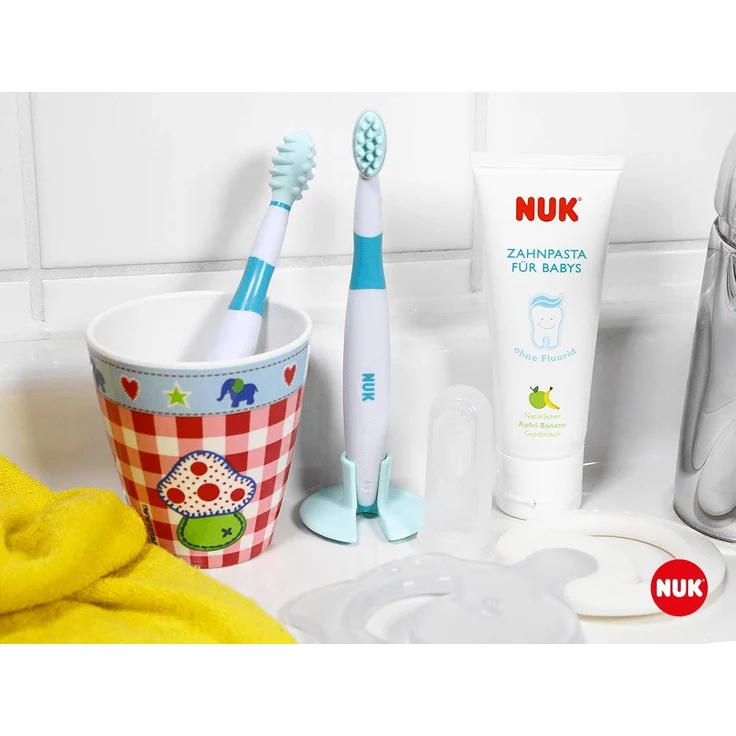 NUK 10256396 Mundpflege-Set mit Baby-Zahnpasta und natürlichem Apfel-Banane Geschmack, incl. Fingerzahnbürste, BPA frei, ohne Fluorid, 1 Stück – Bild 2