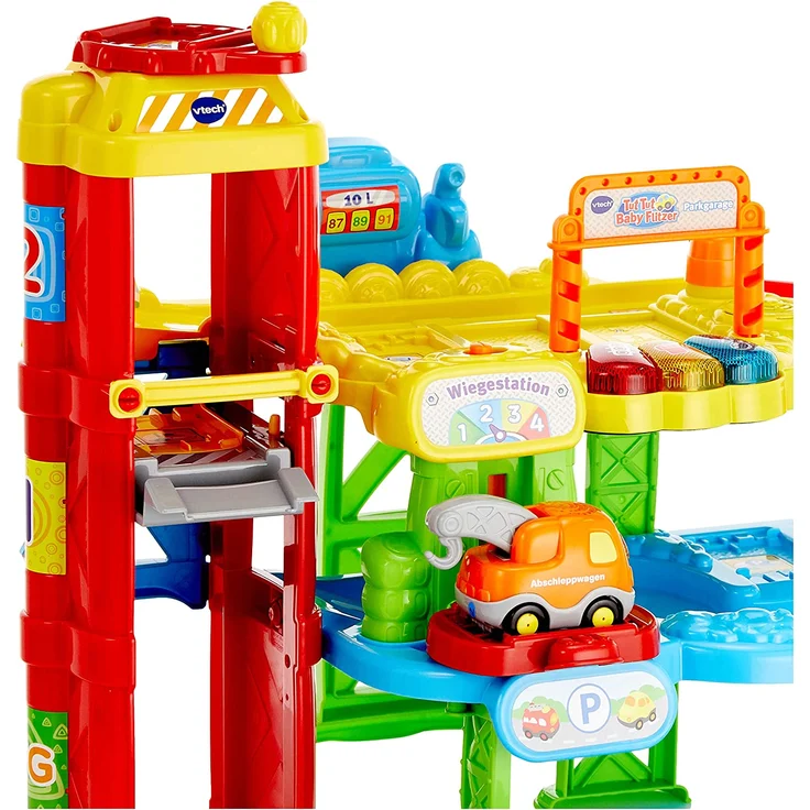 VTech Baby Flitzer - Parkgarage – Interaktives Spielzeug mit Abschleppwagen, Aufzug, Rutsche, Tankstelle u. v. m. – Für Kinder von 1-5 Jahren – Bild 4
