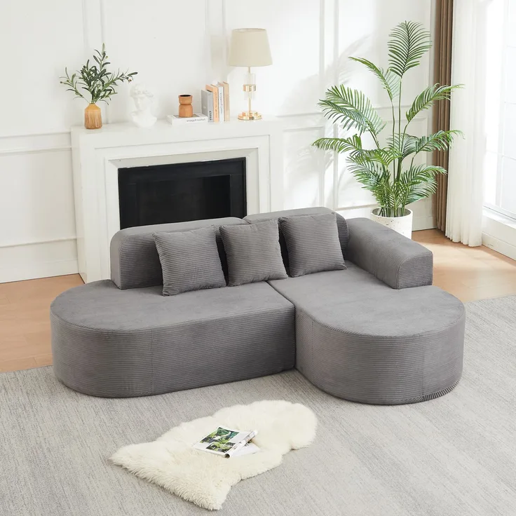 Ecksofa mit großzügiger Sitzfläche, grauer Cordbezug und geschwungenem Chaiselongue-Design,70x220x155 cm