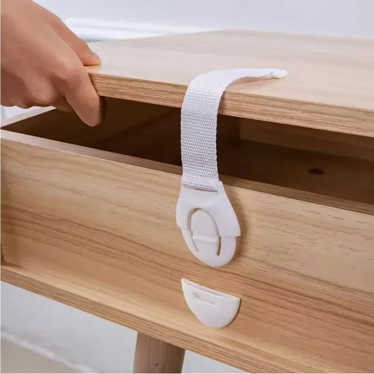 Montegoni Kindersicherung 10x Kindersicherung Baby Schrankschloss Weiß mit Flexband, Selbstklebend, flexibel, ohne Bohren, für Schränke & Schubladen – Bild 3