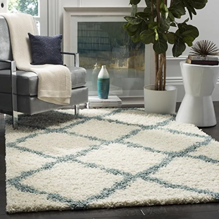 SAFAVIEH Zottelig Teppich für Wohnzimmer, Esszimmer, Schlafzimmer - Dallas Shag Collection, Hoher Flor, Elfenbein und Hellblau, 122 X 183 cm