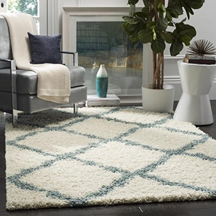 SAFAVIEH Zottelig Teppich für Wohnzimmer, Esszimmer, Schlafzimmer - Dallas Shag Collection, Hoher Flor, Elfenbein und Hellblau, 122 X 183 cm – Bild 1