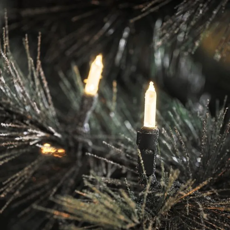 Konstsmide LED Minilichterkette, 120 warm weiße Dioden, 24V Außentrafo, grünes Kabel