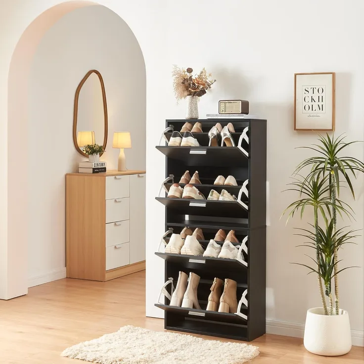 Schuhschrank Sykkylven 134x60x24 cm mit 4 Klappen Schwarz [en. casa]