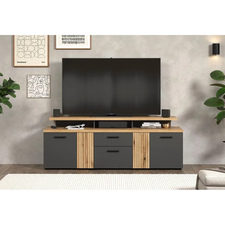 trendteam smart living - Esteban - TV-Schrank - Grau/Eiche - Lowboard mit 4 Türen, 1 Schublade, 1 Klappe, 3 offene Fächer - (BxHxT) 180 x 67 x 47 cm - 2 Türen in Rillenoptik, rechts/Links montierbar