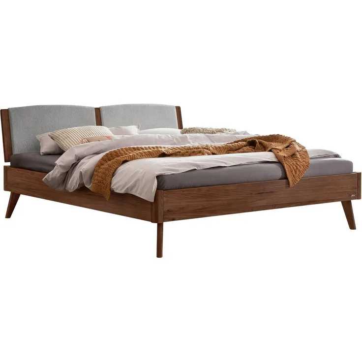 Hasena Massivholzbett Fabro Nussbaum mit gepolstertem Kopfteil 180x200 cm, Fußhöhe 20 cm – Lounge