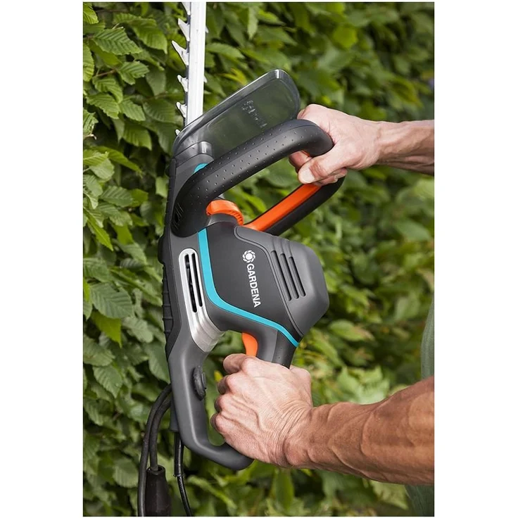GARDENA Elektro-Heckenschere PowerCut 700-65: Heckenschneider mit 700 W Motorleistung, 65 cm Messerlänge, 27 mm Messeröffnung, ergonomischer Griff und Anschlagschutz (9835-20) – Bild 4