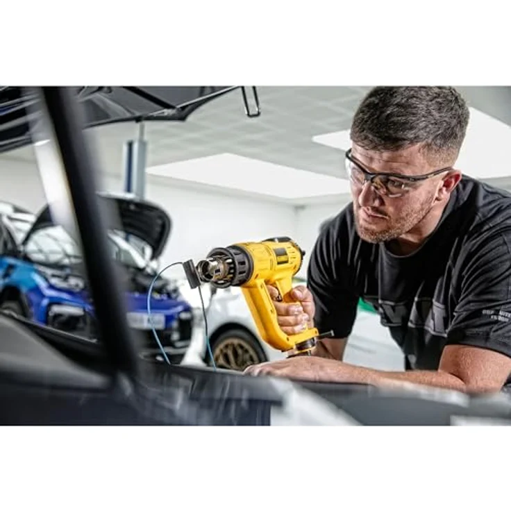 DeWalt 2.000 Watt Heißluftpistole - Heißluftgebläse (50 - 600°c Betriebstemperatur, Luftdurchsatz 650 l-min, mit Überlastschutz, auch im Stationärbetrieb einsetzbar, inkl. Konusdüse und Punktdüse), D26414 – Bild 2
