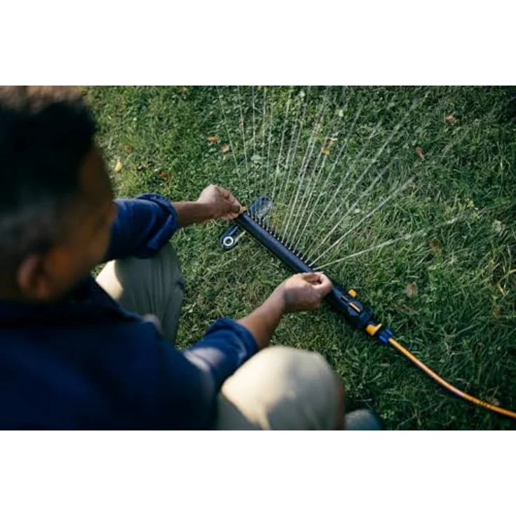 Fiskars X-Series Oszillierender Regner S–L, Inkl. herausnehmbarem Filter und Werkzeug zur Düsenreinigung, Sprinkler für 300-500 m², Schwarz/Orange – Bild 5