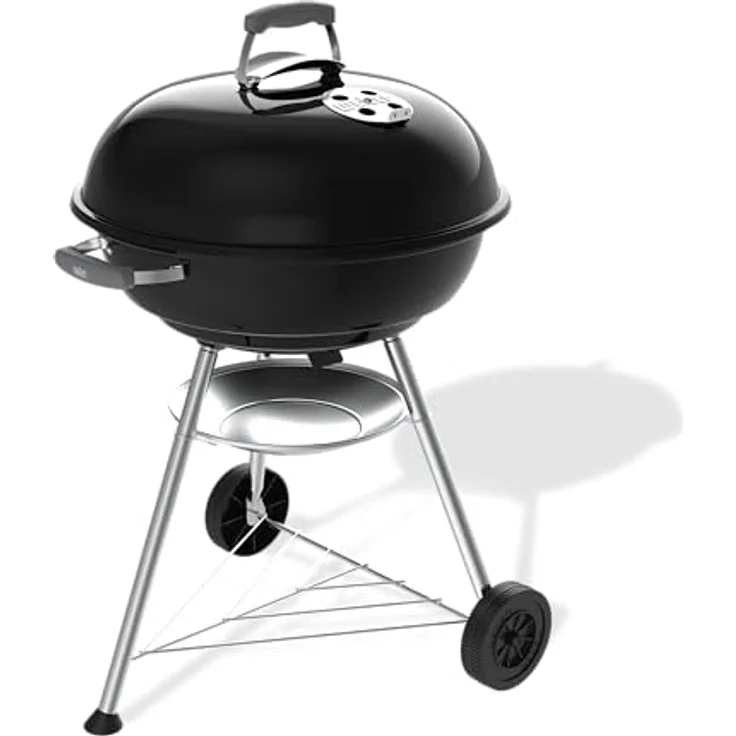 Weber Compact Kettle Holzkohlegrill (2026 Version), 57 cm, rostfreies Design mit verchromtem dreilagigem Rost, Schwarz, mit Dreibein-Ständer und Rädern – Bild 1