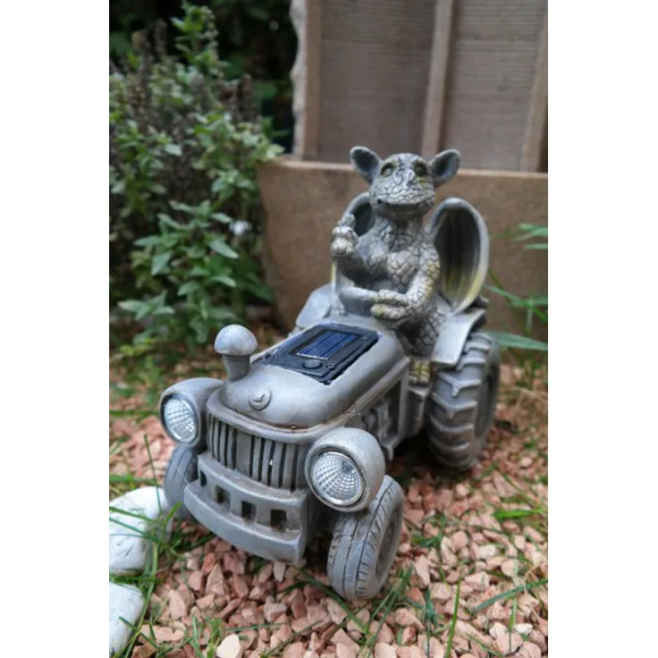 Drachenkind auf Tracktor mit Solar Laterne Drache Figur Gartenfigur Liebe