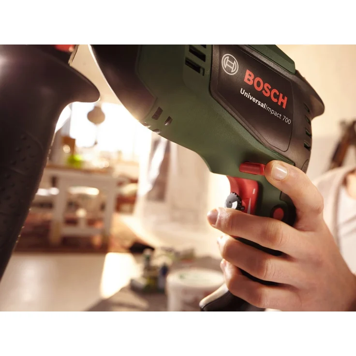 Bosch Schlagbohrmaschine UniversalImpact 700 (Zusatzhandgriff, Tiefenanschlag, Koffer, 700 Watt) – Bild 4