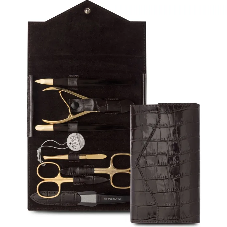 Nippes Croco Maniküre-Set vergoldet, inkl. Hautschere, Nagelschere, Saphirfeile, Pinzette, Reiniger, Nagelzange & Drücker, mit 18 kt vergoldet, Lackleder-Etui mit Krokoprägung