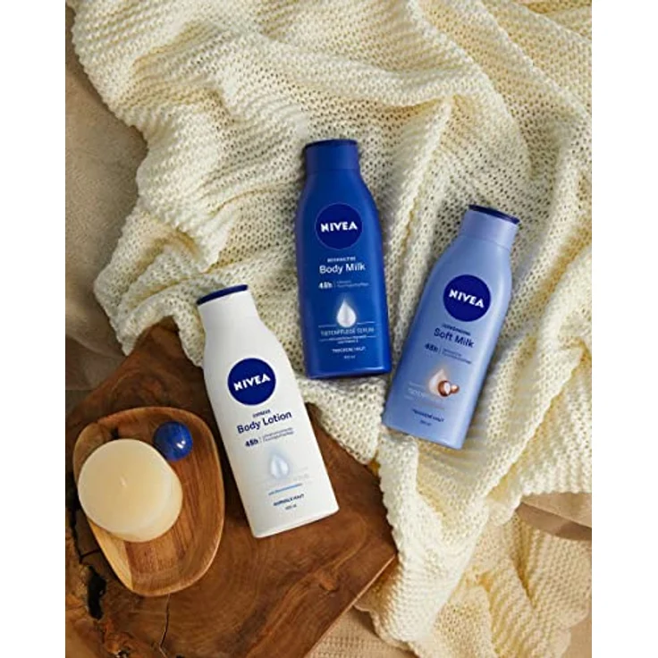 NIVEA Verwöhnende Soft Milk (400 ml), Body Milk für trockene Haut mit Tiefenpflege Serum, Feuchtigkeitspflege mit Shea Butter natürlichen Ursprungs – Bild 4