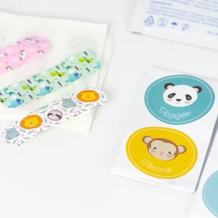 FLEXEO Erste-Hilfe-Set für Kinder, 47-teilig mit süßen Pflastermotiven, Fingerpuppe und Stickern, kompakt für unterwegs – Bild 3