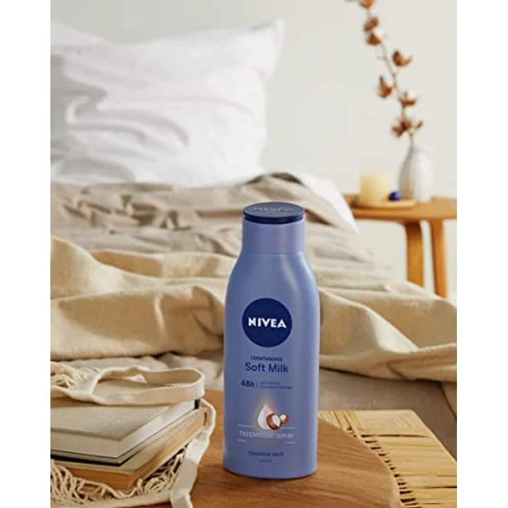 NIVEA Verwöhnende Soft Milk (400 ml), Body Milk für trockene Haut mit Tiefenpflege Serum, Feuchtigkeitspflege mit Shea Butter natürlichen Ursprungs – Bild 5