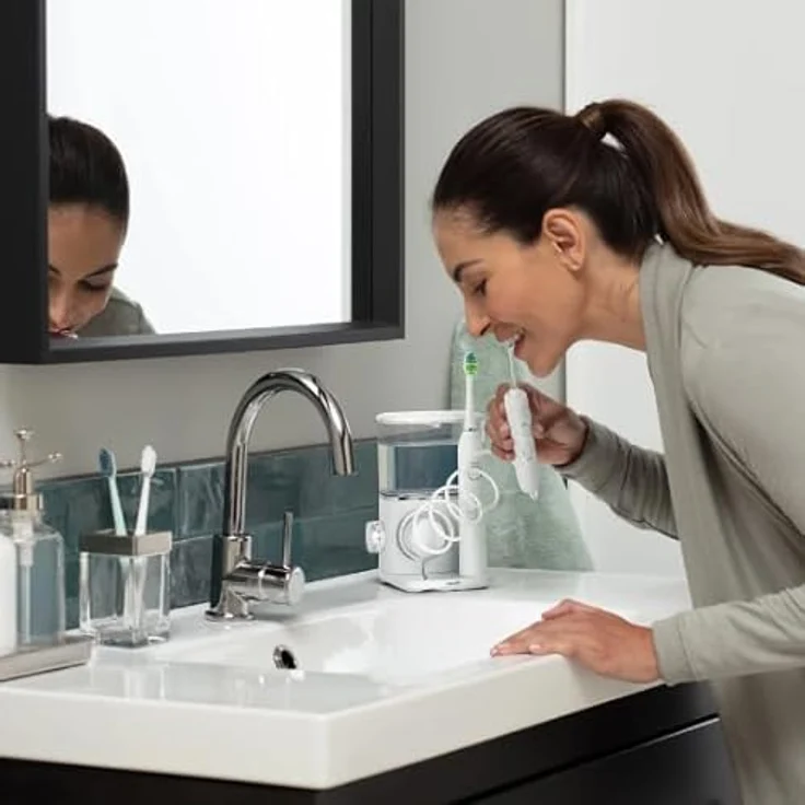 Waterpik Complete Care White 985 WP-CC-04, Munddusche mit Schallzahnbürste, 3 Reinigungsmodi, Lithium-Ionen-Akku, 651 ml Tankinhalt – Bild 7