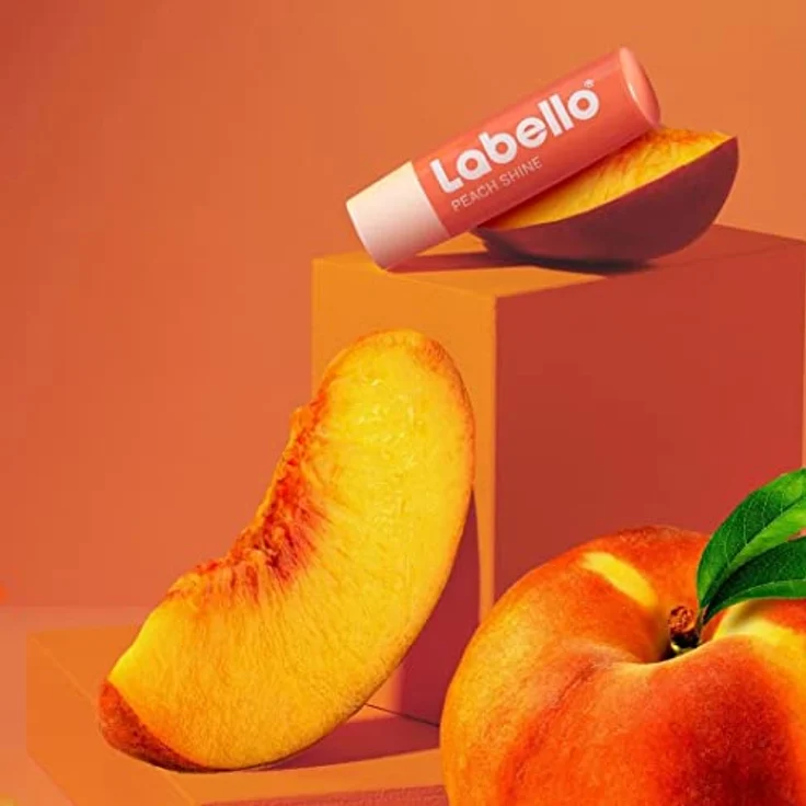 Labello Peach Shine Lippenbalsam 4,8 g, feuchtigkeitsspendender Lip Balm mit Pfirsicharoma und Farbpigmenten, 24h Schutz mit Sheabutter – Bild 4