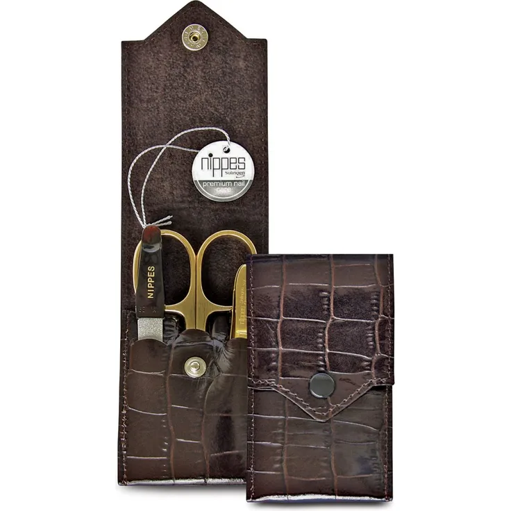 Nippes Croco Taschen-Maniküre-Set vergoldet, inkl. Kombinierte Haut- und Nagelschere, Saphirfeile & Pinzette, mit 18 kt vergoldet, Lackleder-Etui mit Krokoprägung