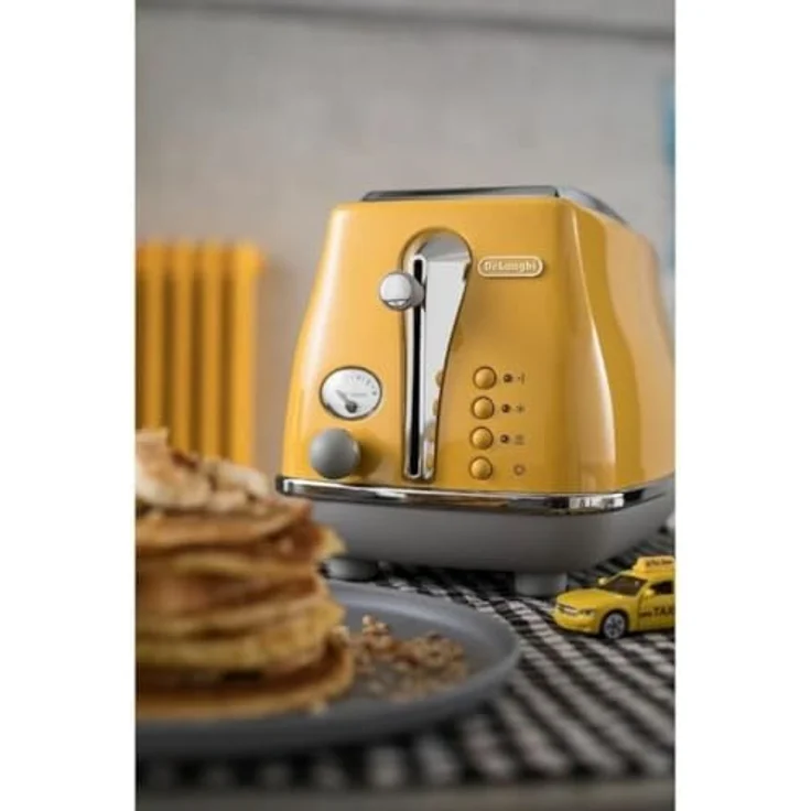 De'Longhi Icona Capitals CTOC 2103.Y 2-Schlitz-Toaster, 900 Watt, 6 Bräunungsstufen, inkl. Krümelschublade, Sandwichzange, gelb – Bild 6