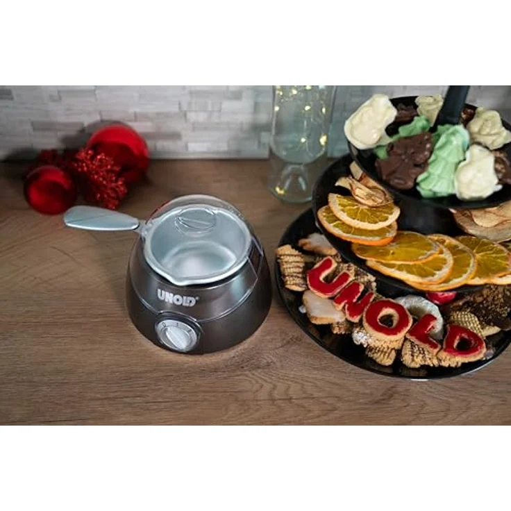 Unold 48967 Chocolatier Sparset Schokobrunnen Schokofondue Inkl. 12 Gießformen mit Weihnachtsmotive, 25 Watt (braun/silber) – Bild 2
