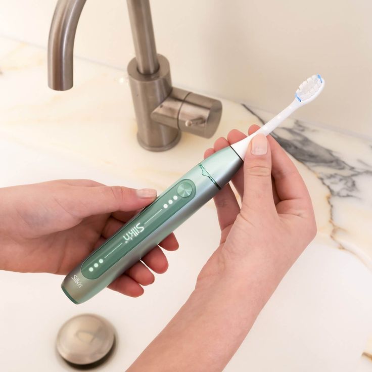 Silk'n SonicYou elektrische Zahnbürste, 3 Putzmodi, inkl. 2 Aufsteckbürsten mit 2 Schutz- Etuis, lightgreen – Bild 5