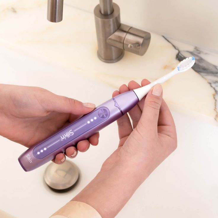 Silk'n SonicYou elektrische Zahnbürste, 3 Putzmodi, inkl. 2 Aufsteckbürsten mit 2 Schutz- Etuis, purple – Bild 5