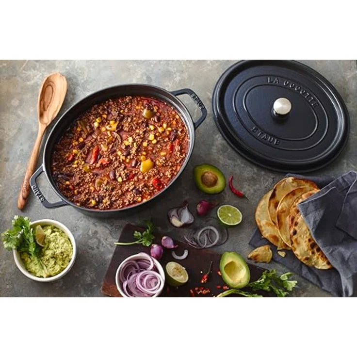 Staub 40509-315-0 Cocotte-Bräter, oval mit Deckel 29 cm, 4,25 L, mit mattschwarzer lierung im Inneren des Topfes, schwarz – Bild 5