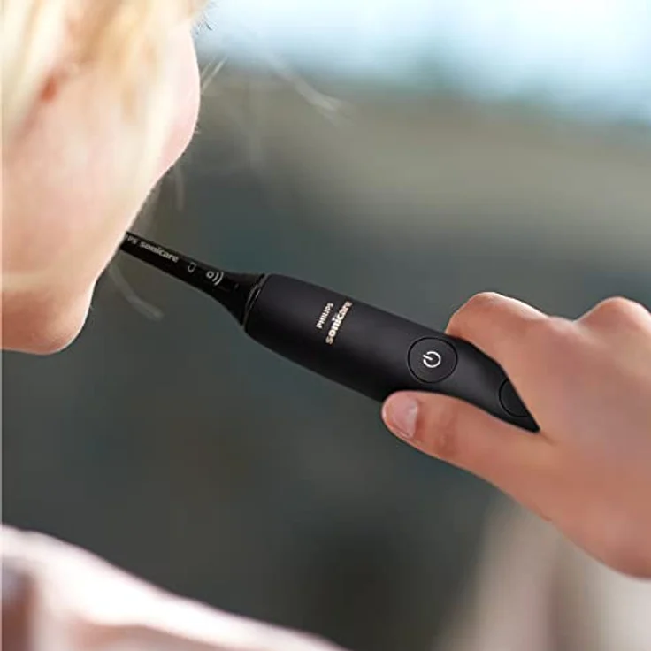 Philips Sonicare DiamondClean 9000 Elektrische Zahnbürste Doppelpack - 2 Schallzahnbürsten, 1 Ladeglas, 4 Premium Bürstenköpfe, neue Generation, schwarz & rosé-gold, 2 Handstücke (Modell HX9914/61) – Bild 3