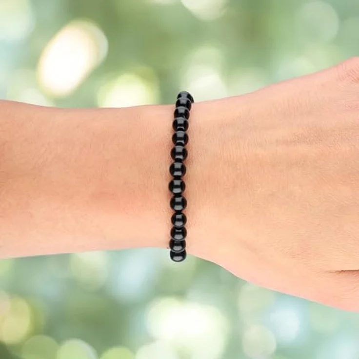Lebensquelle Plus Kugelarmband Onyx, dehnbares Perlenarmband mit 6 mm Edelsteinperlen, elegantes Damen-Schmuckstück inklusive Edelsteinkarte – Bild 2