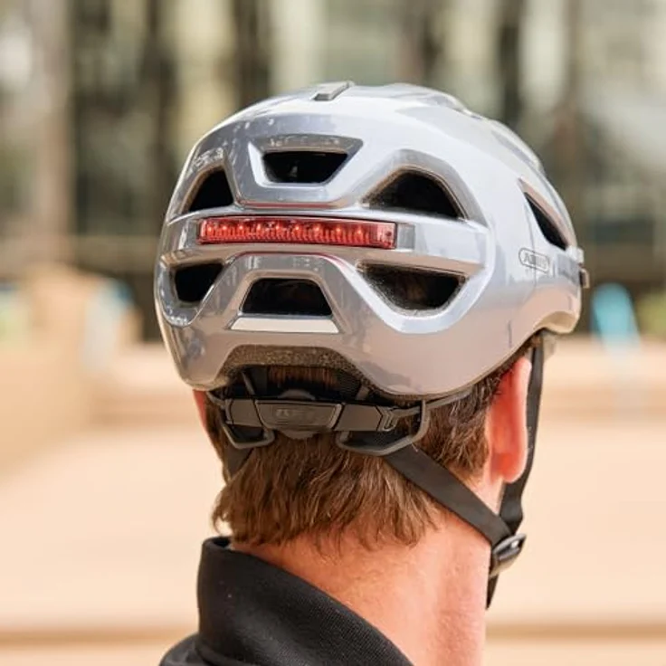 ABUS Urban-I 4.0, Fahrradhelm mit aufladbarem Rücklicht, 2 Leuchtmodi, Zopf-Öffnung, magnetischem Verschluss, Größe M, silber – Bild 11