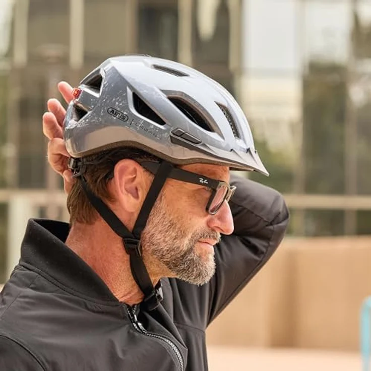 ABUS Urban-I 4.0, Fahrradhelm mit aufladbarem Rücklicht, 2 Leuchtmodi, Zopf-Öffnung, magnetischem Verschluss, Größe M, silber – Bild 10